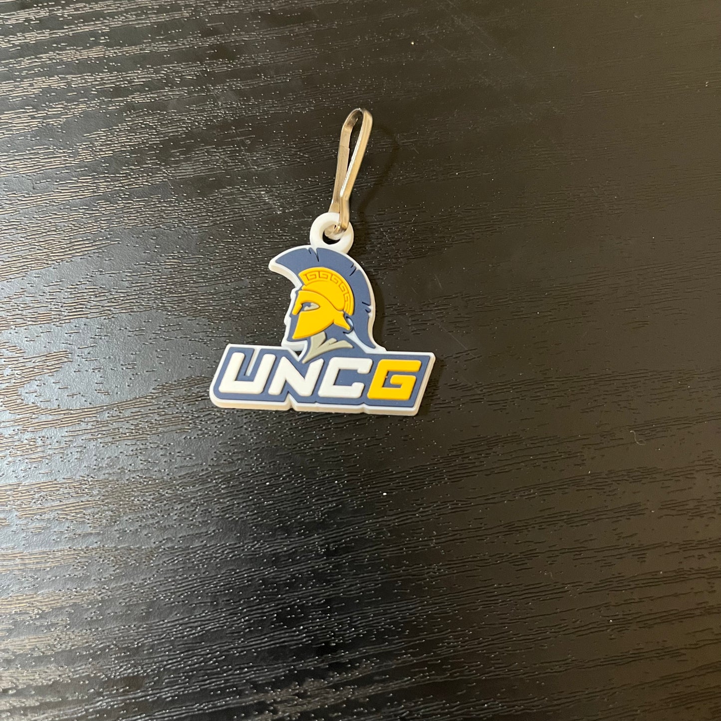 Zipper Pull - Spartan + UNCG logo in soft PVC material (1.5" size)