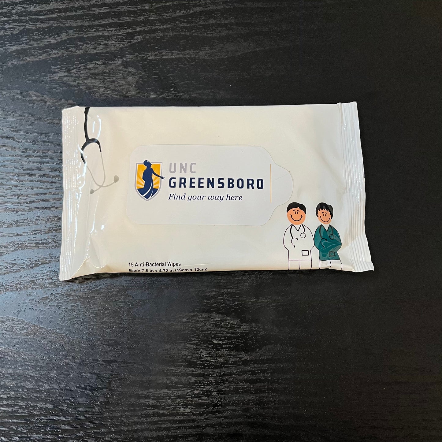 Antibacterial Pouch Wipes - with Nurses and the UNCG Find your way here logo