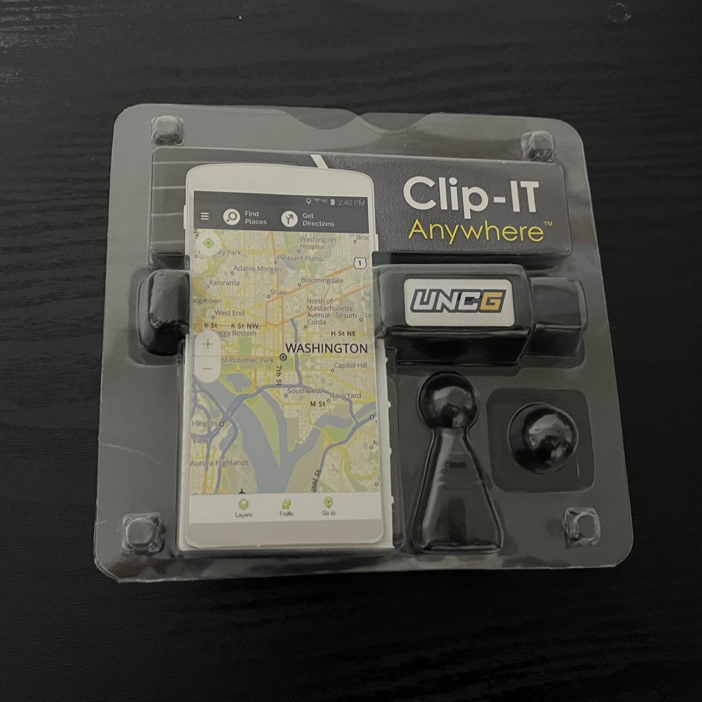 Cellphone Holder w/ UNCG logo  Mounts on car air vent or dashboard. "Clip-IT Anywhere"